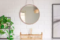 Refresh Your Mirror Frame with a Can of Spray Paint